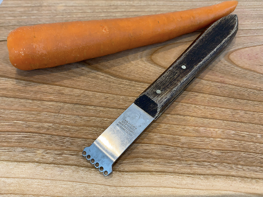 Start with a washed, trimmed carrot and a sturdy zester.